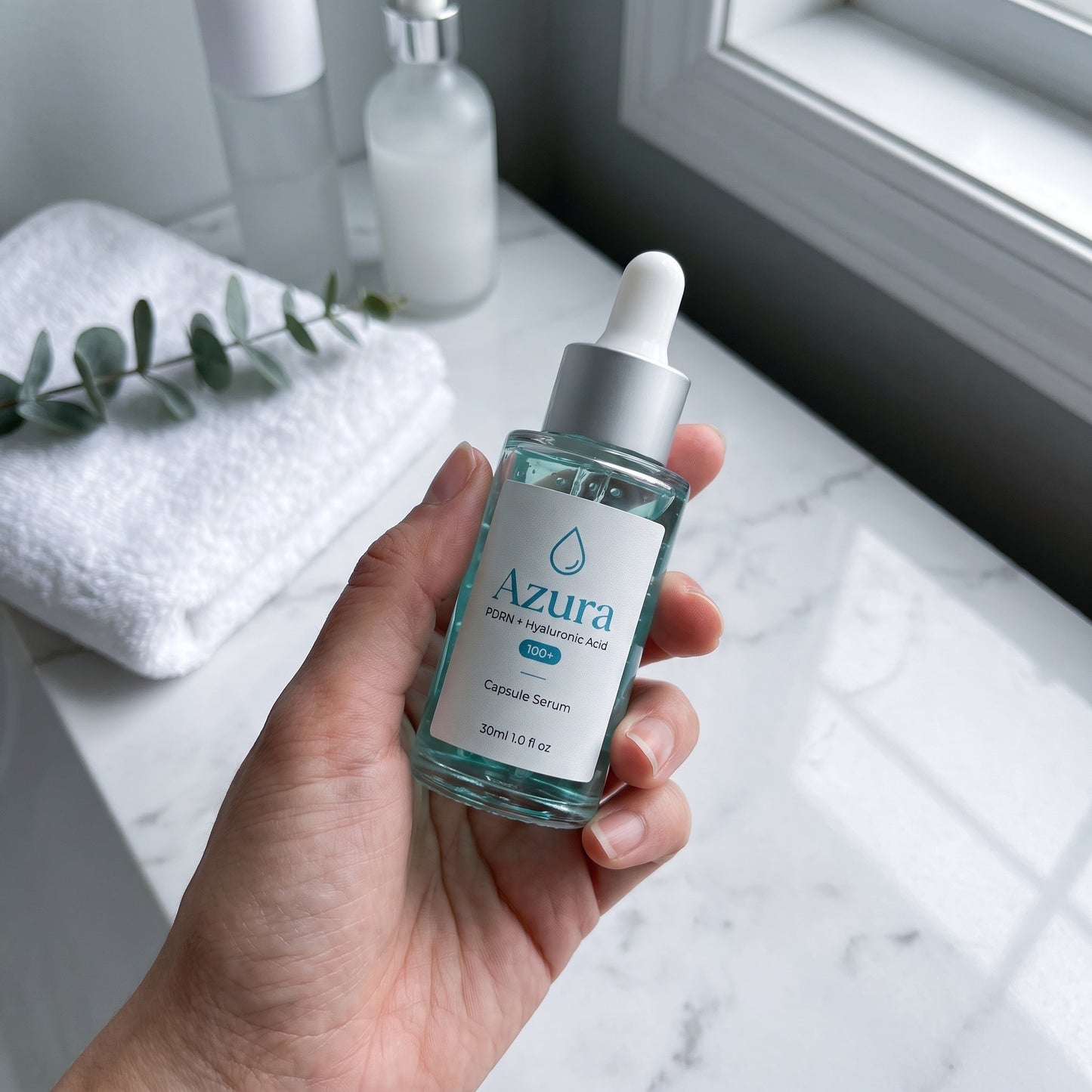 Azura serum on a marble bathroom vanity