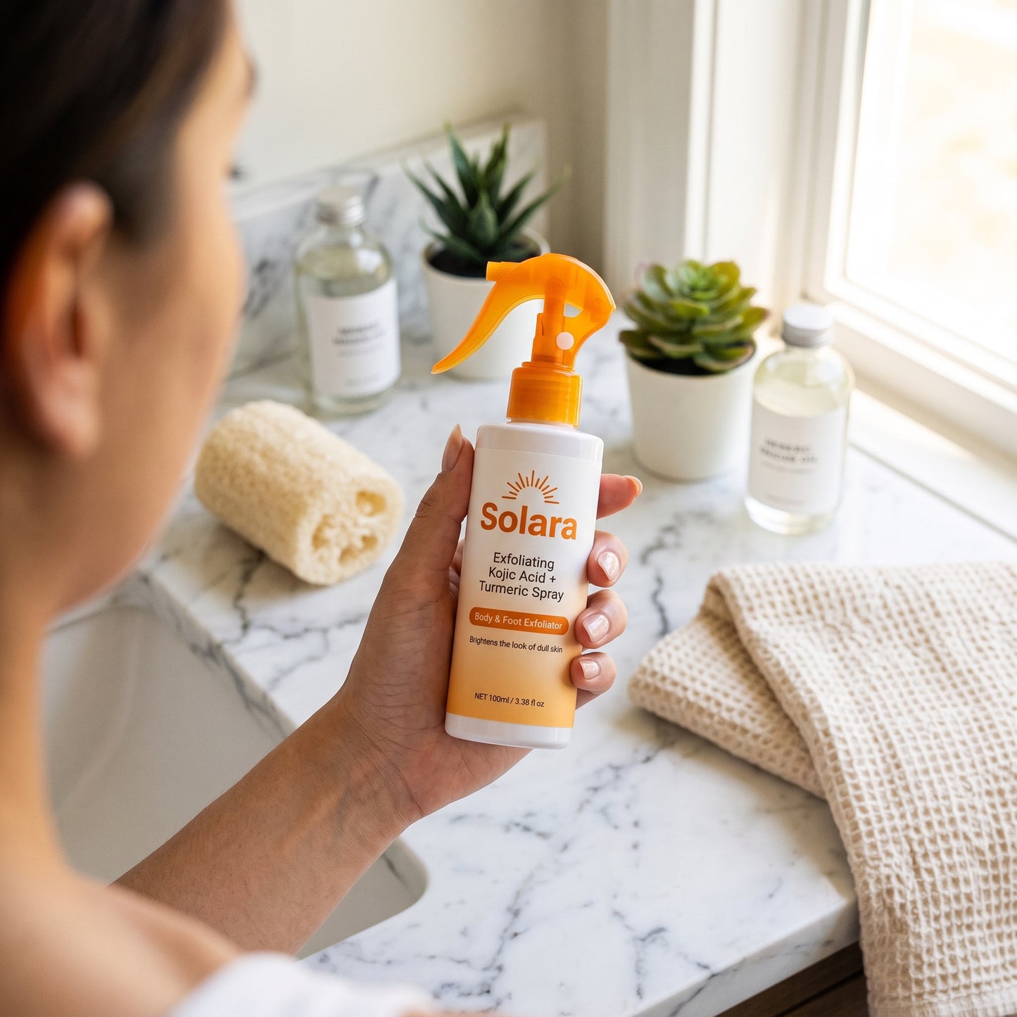 Solara body spray on a bright bathroom vanity