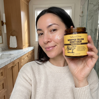 Woman holding TallowGlow Whipped Tallow Honey Balm