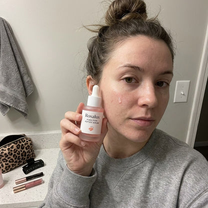 Woman using Rosalux PDRN Pink Peptide Serum at home